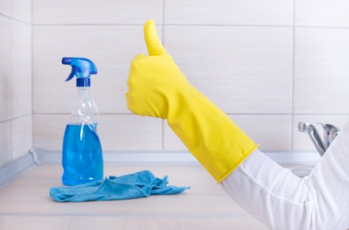 Deep upholstery cleaning removing dust and stains from a living room sofa
